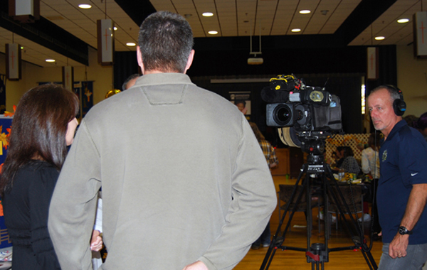 Steve Harper, a photographer with the French television network TF1, interviews a prospective adoptive family.